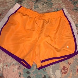 Danskin orange, purple, and white Workout shorts